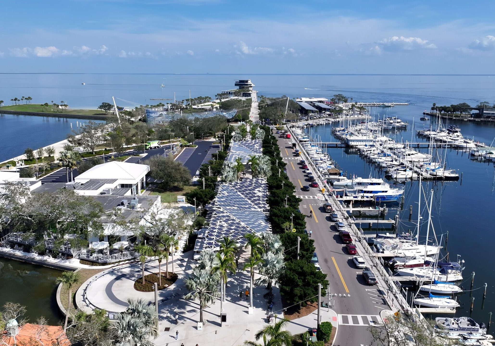 Saint Pete Pier In Saint Petersburg Florida United States. Breathtaking Aerial View Of A Lush Tropical Coastline Scenery. Business Sky Downtown Cityscape. Business Backgrounds Panorama.
